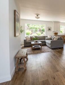 LVP installation in a living room - luxury vinyl plank flooring acclimating before installation