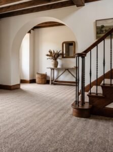 Ortiz Flooring team installing new carpet on a staircase transition in a North Carolina home