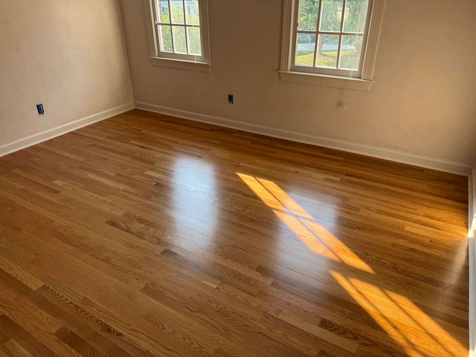 Completed hardwood flooring in a residential home in Raleigh NC